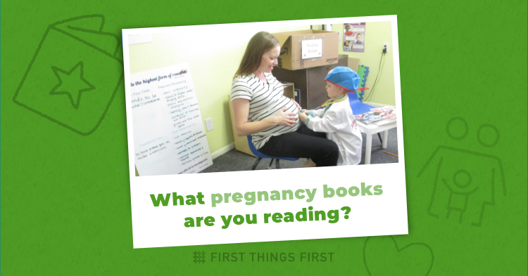 Pregnant mom with toddler son holding her belly